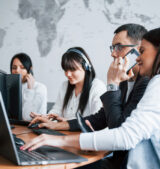 Manager in luxury wear. Business people working on their new project in classroom IT support services dubai