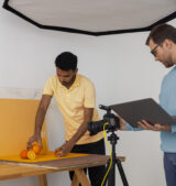 medium-shot-specialized-photographers-working-studio Media Production