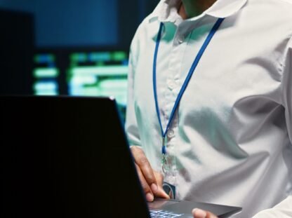 Engineer in data center fixing issues IT Infrastructure Solutions for Healthcare in Dubai