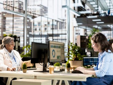 Female manager engaged in budget analysis and strategy development new Dubai office IT infrastructure setup guide 2026