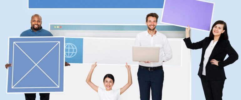 Happy diverse people holding a wed design board Web Design Trends Dubai 2026